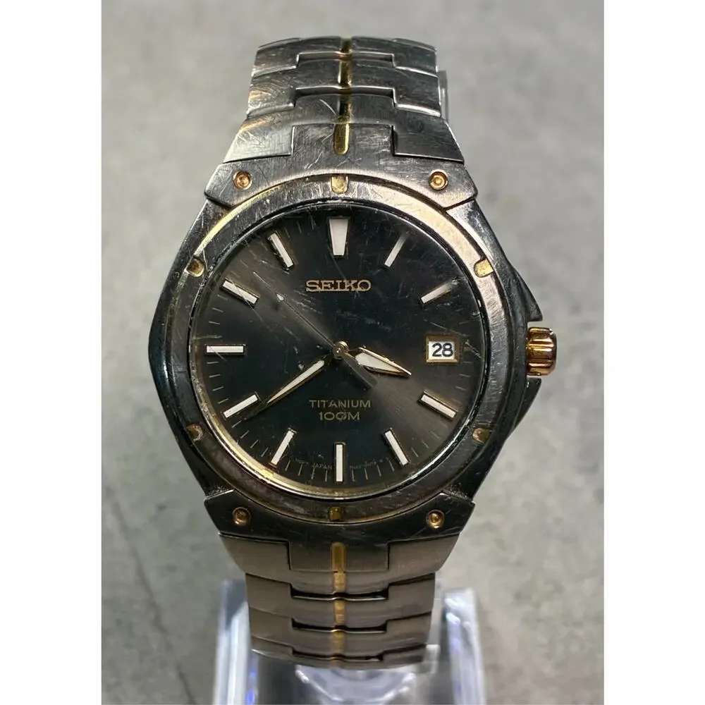 Seiko Titanium Men's Watch 7N42‑0CA0 100M Black Sunburst Dial Date Japan Working